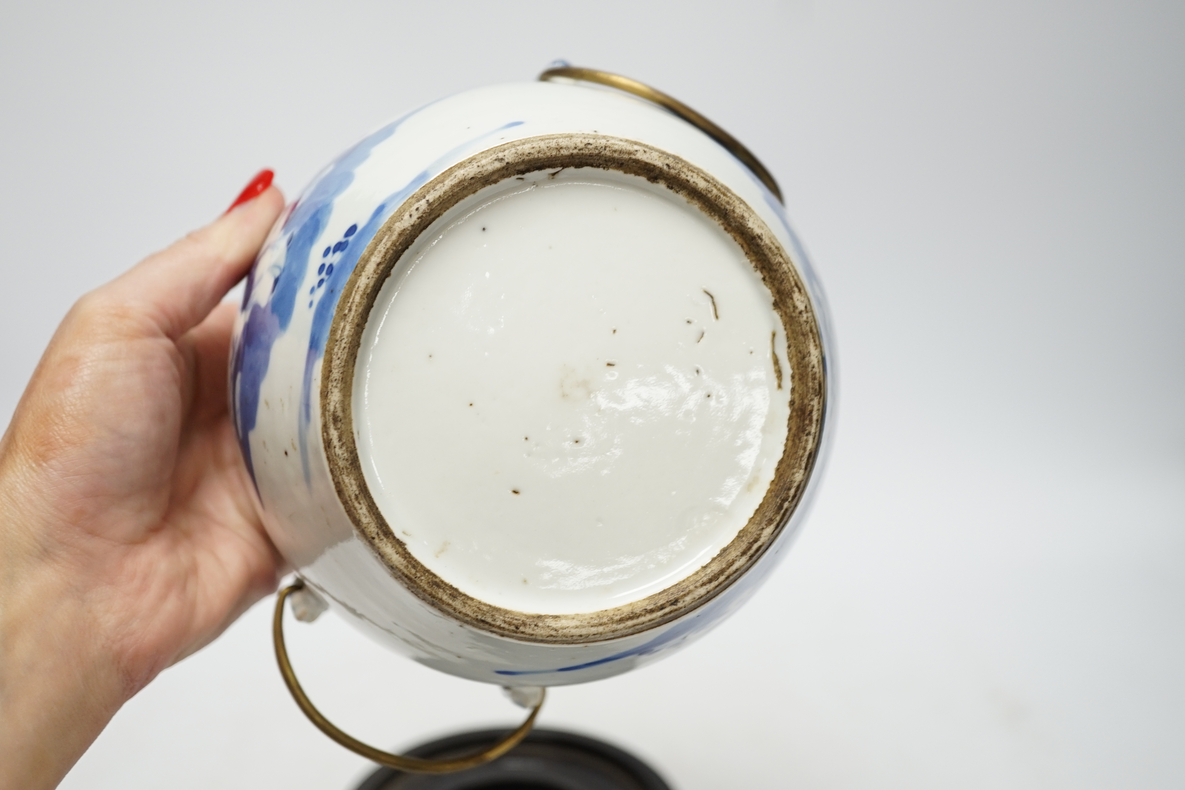 A Chinese Straits blue and white bowl and cover, kamcheng, late 19th century, with twin handles, on hardwood stand, 19cm high